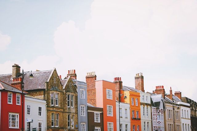 How can maintaining your home reduce your insurance premiums?